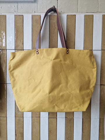 TOTELY BUCKET TOTE in yellow