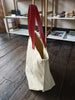 TOTELY BUCKET in BEIGE canvas and scarlet red shoulder straps
